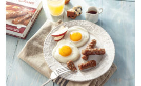 Eggs Sunny Side Up Breakfast Sausage Plated