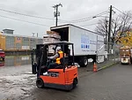 Northwest-Harvest.-Forklift-unloading-Foster-Farms-turkey-donations.jpg