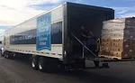 Pallets-of-Foster-Farms-donations-on-truck.jpg