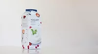 Elopak Elopak white fiber board packaging for cold chain beverages.