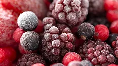 Close-up image of various frozen berries.