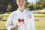 Chef Holding Cloud Nine Tomatoes